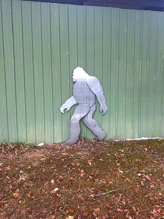 Bigfoot sneaking by the barn