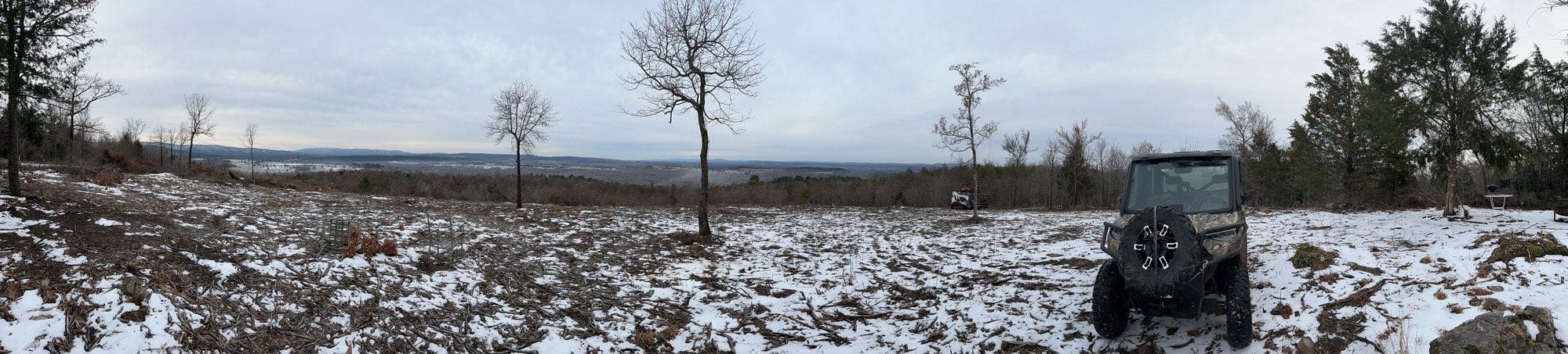 Panoramic view from the Panorama Ranch hilltop across the valley to the mountains